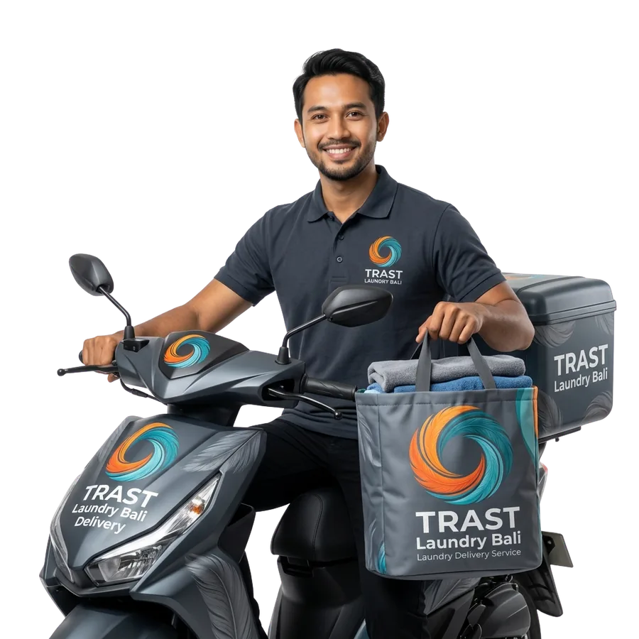 TRAST Laundry Bali delivery staff member on a scooter holding a laundry bag